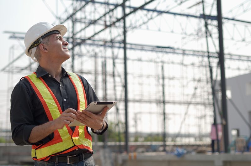 A safety inspector conducting a construction site safety audit.